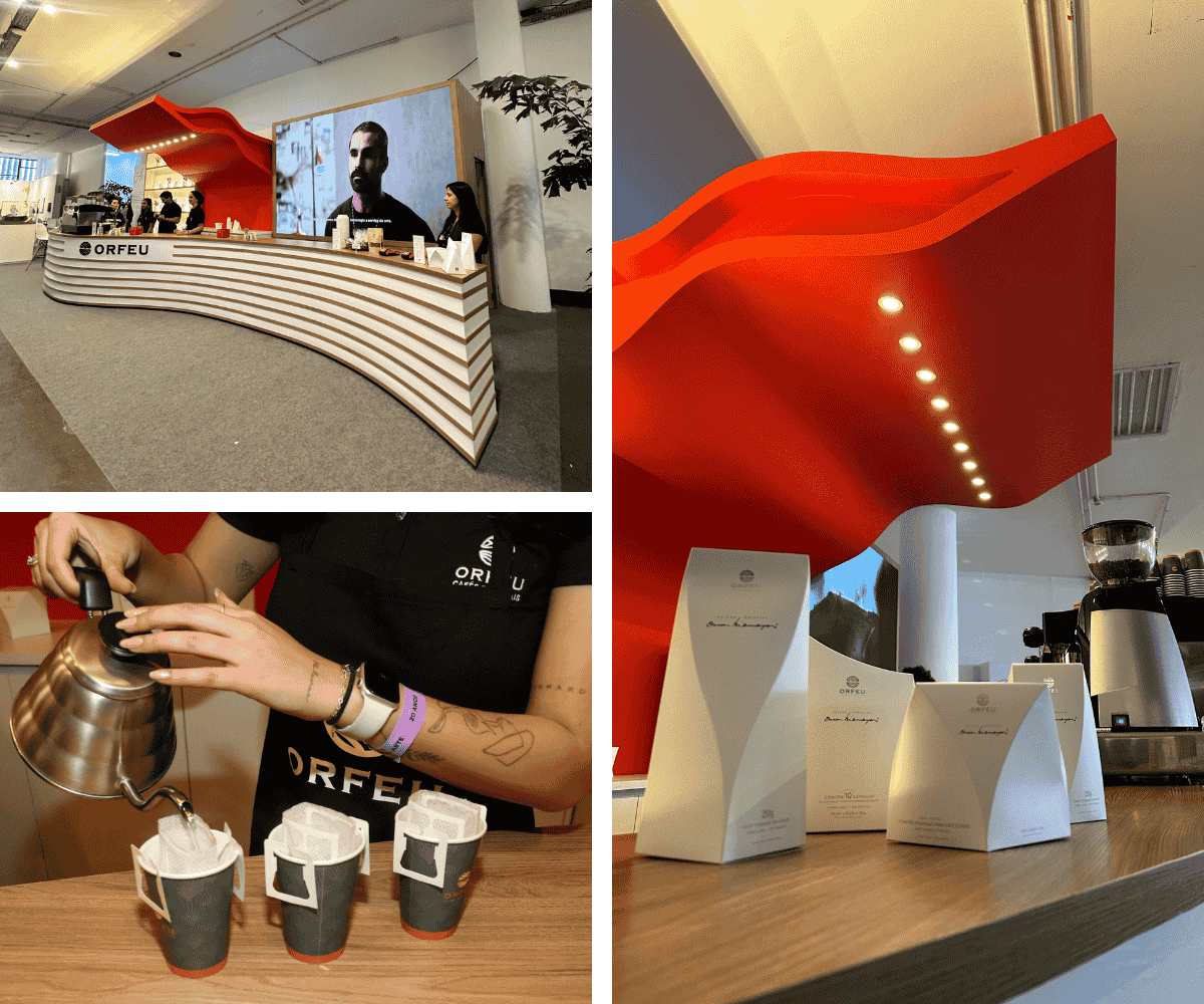 Estande Orfeu Cafés com arquitetura inspirada em Niemeyer, balcão de atendimento, identidade visual marcante e experiência imersiva de marca.